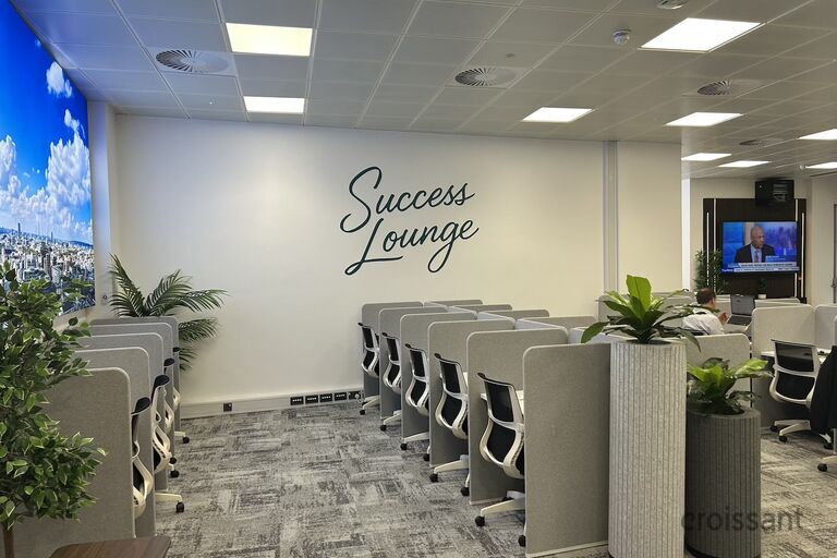 a room filled with furniture and a flat screen tv