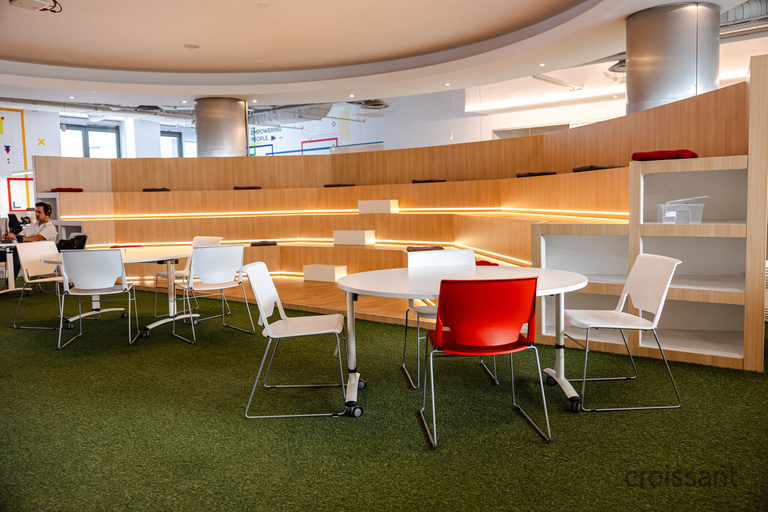 a large room with tables and chairs