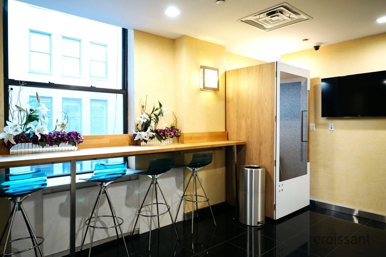 a kitchen with a sink and a window