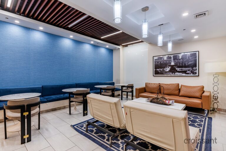 a living room filled with furniture and a table