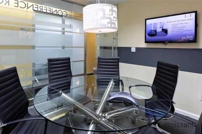 a chair sitting in front of a computer