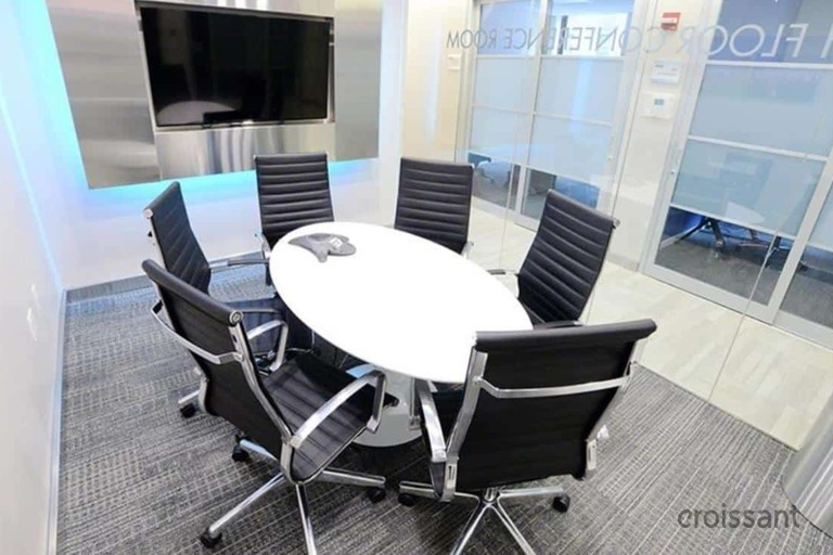 a chair sitting in front of a window