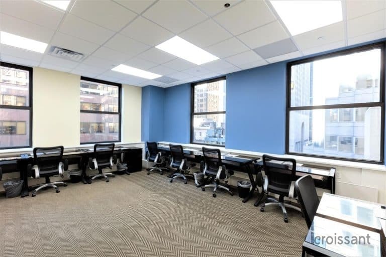 a room filled with furniture and a large window