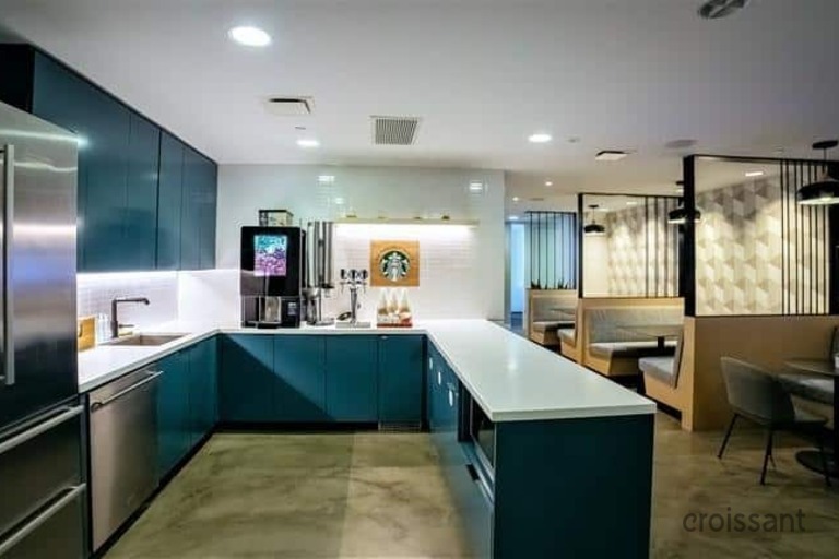 a modern kitchen with stainless steel appliances