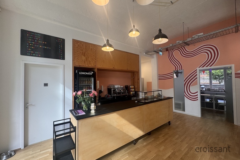 a kitchen with a table in a room