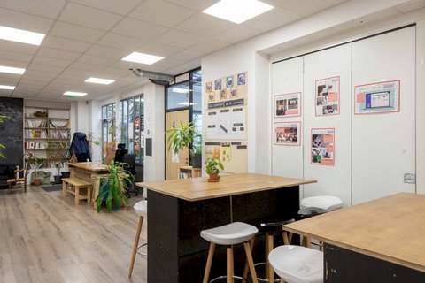 a kitchen with a table in a room