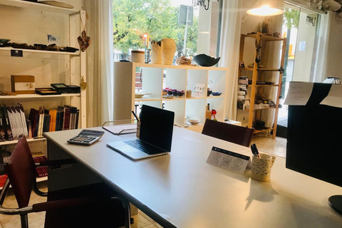 a desk with a laptop in a room