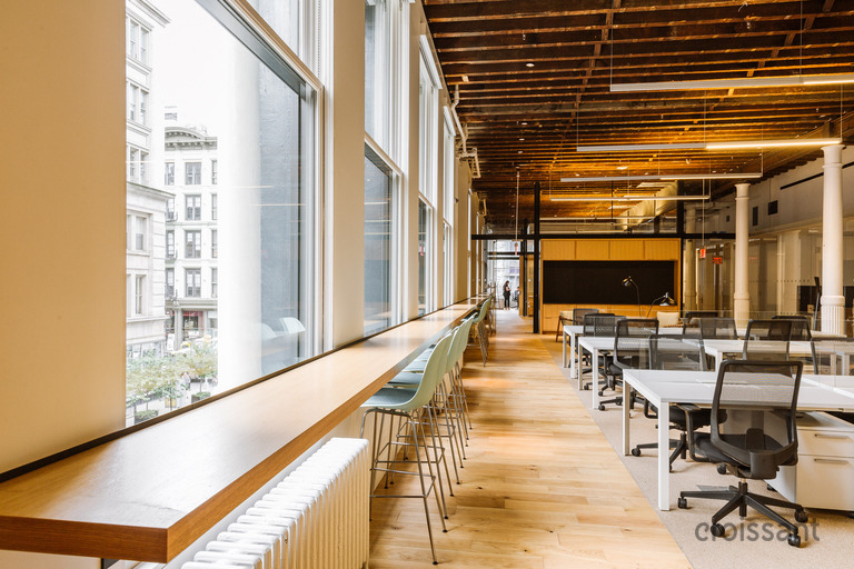 a dining room table in front of a building