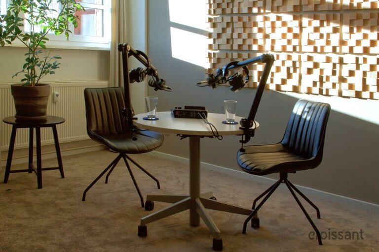a chair sitting in front of a window
