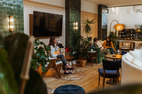 a living room filled with furniture and a fire place