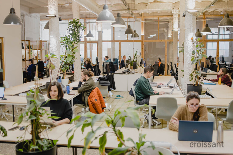 a group of people sitting at a table
