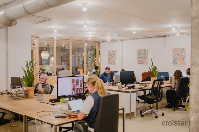 a living room filled with furniture and a table