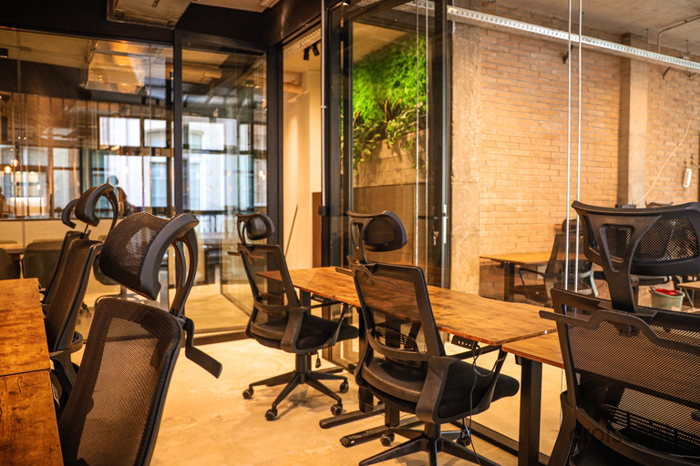 a dining room table in front of a window
