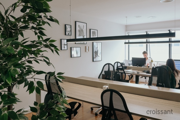a person sitting in a kitchen