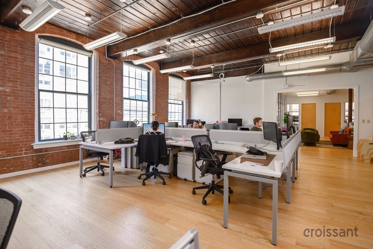 a room filled with furniture and a fireplace