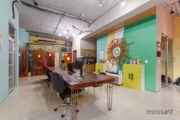 a room filled with furniture and a table