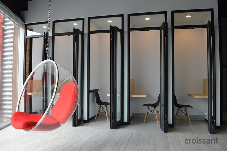 a large red chair in a room