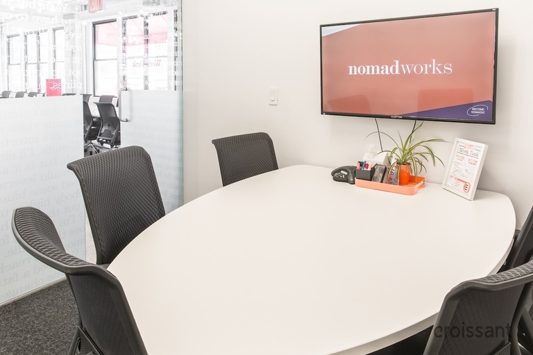 a living room with a couch and a chair