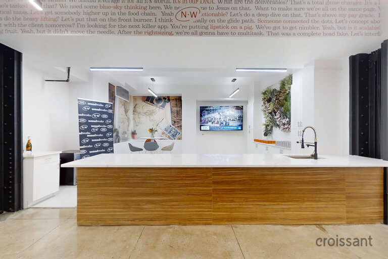 a kitchen with wooden cabinets