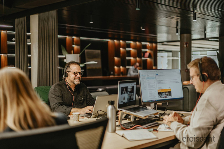 a group of people sitting at a table