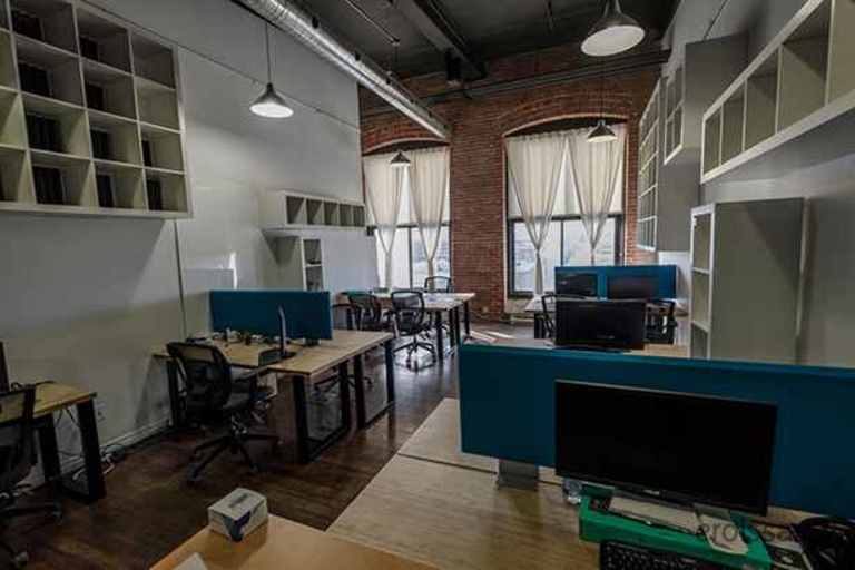 a room filled with furniture and a table