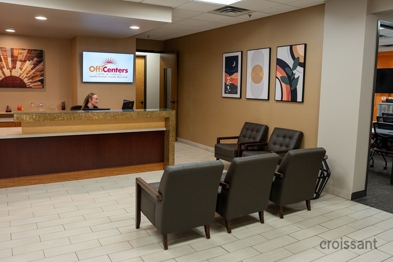 a room filled with furniture and a flat screen tv