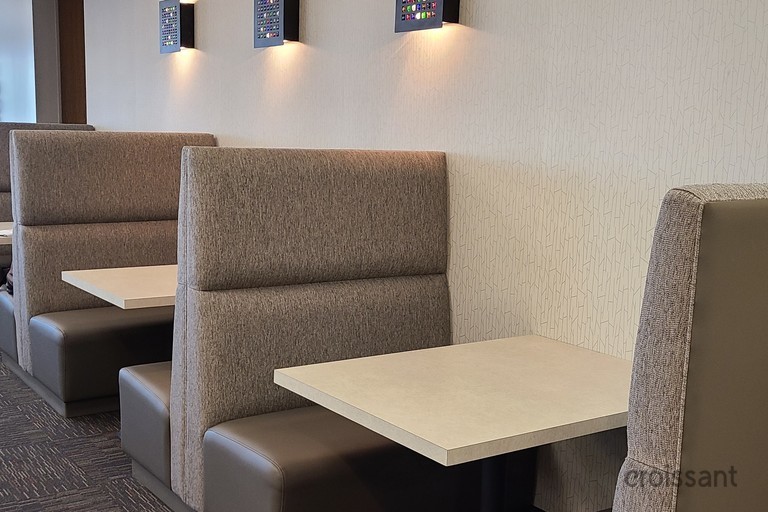 a chair sitting in front of a table