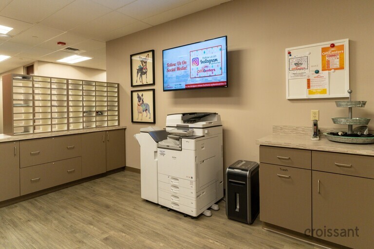 a kitchen with a stove and a refrigerator
