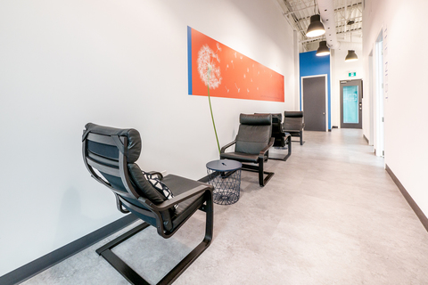 a large red chair in a room