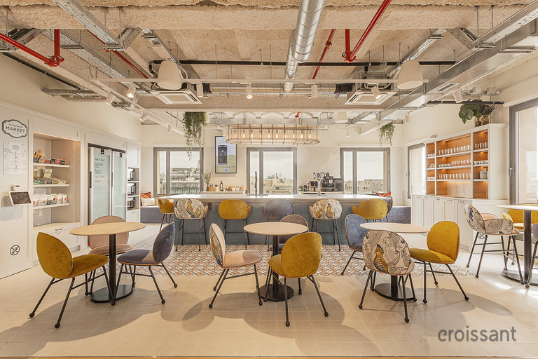 a dining room table in front of a building