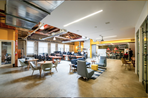 a room filled with furniture and a table in a restaurant