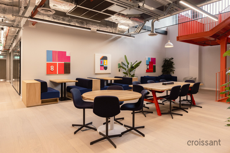a room filled with furniture and a table