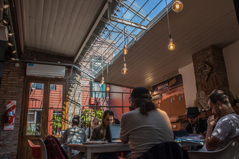 a group of people sitting at a table in a restaurant