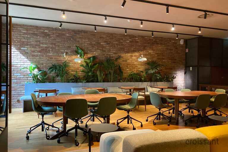 a room filled with furniture and a table