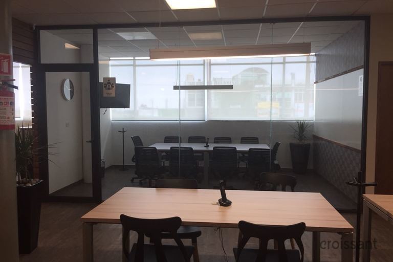 a room filled with furniture and a table