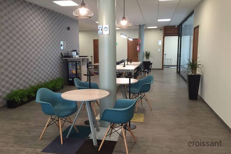 a room filled with furniture and a table