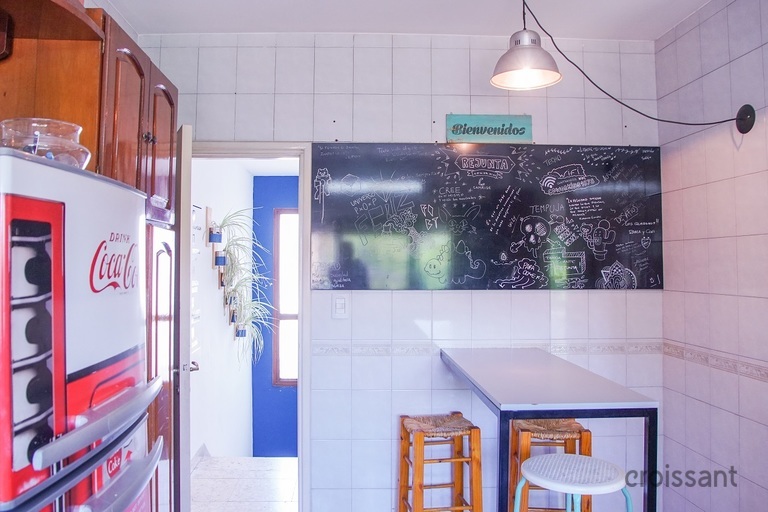 a white refrigerator freezer sitting inside of a kitchen