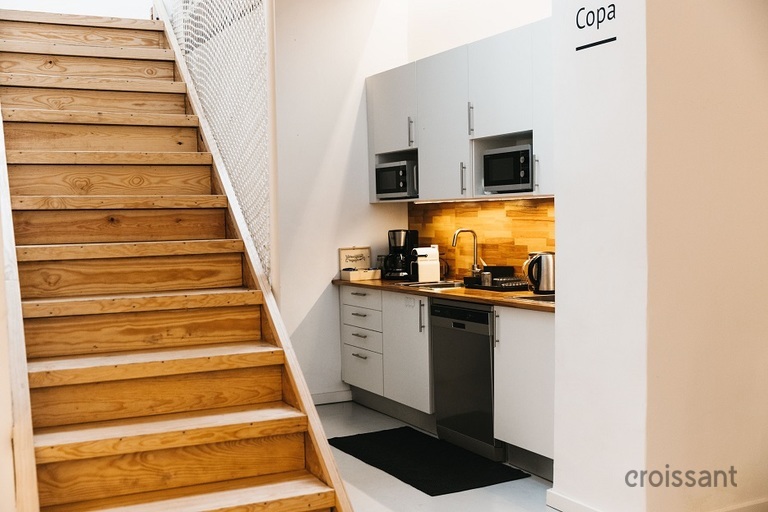 a white refrigerator freezer sitting inside of a kitchen