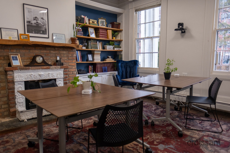 a living room filled with furniture and a fireplace