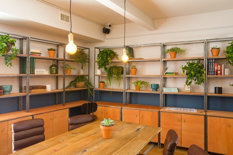 a kitchen with a table in a room