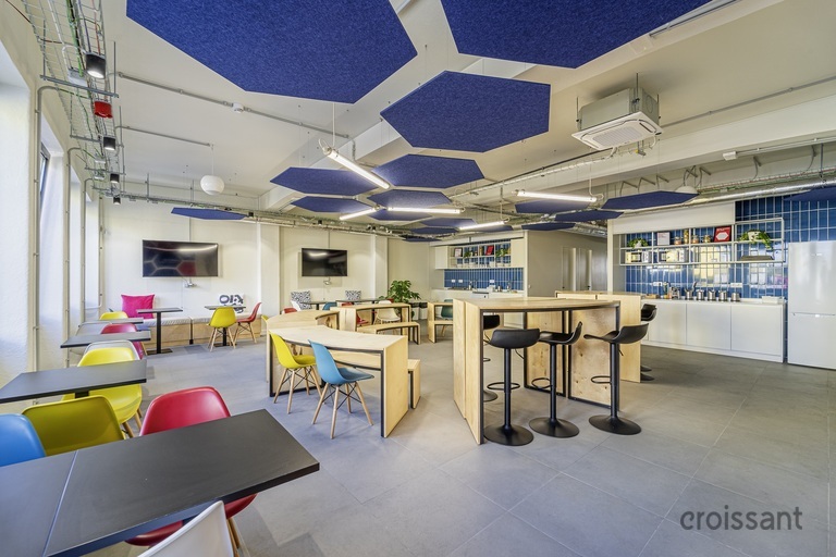 a room filled with furniture and a table