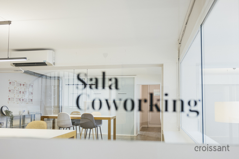 a kitchen with a table in a room