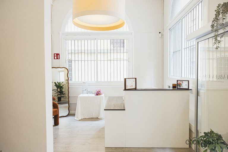 a kitchen with a sink and a refrigerator