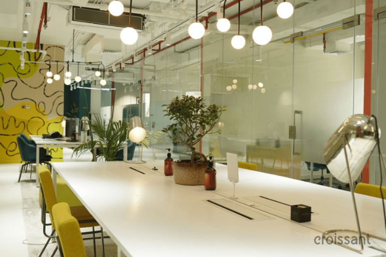 a kitchen with a table in a room