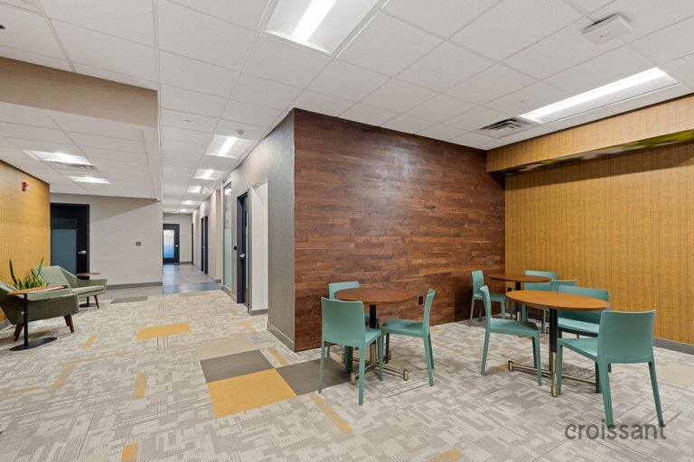 a room filled with furniture and a table
