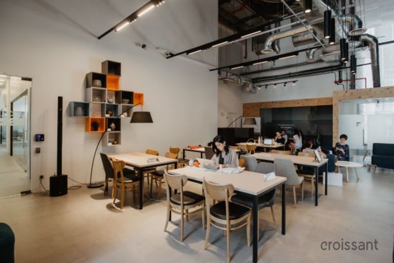 a room filled with furniture and a table