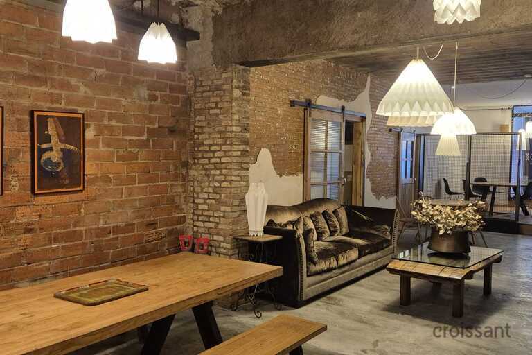 a living room filled with furniture and a fire place