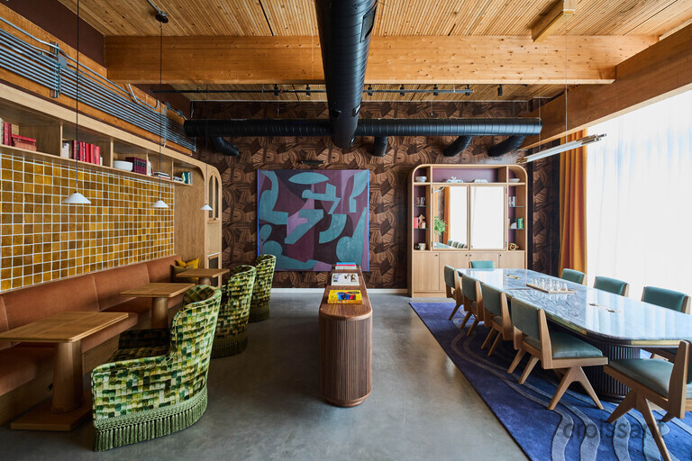 a room filled with furniture and a large window