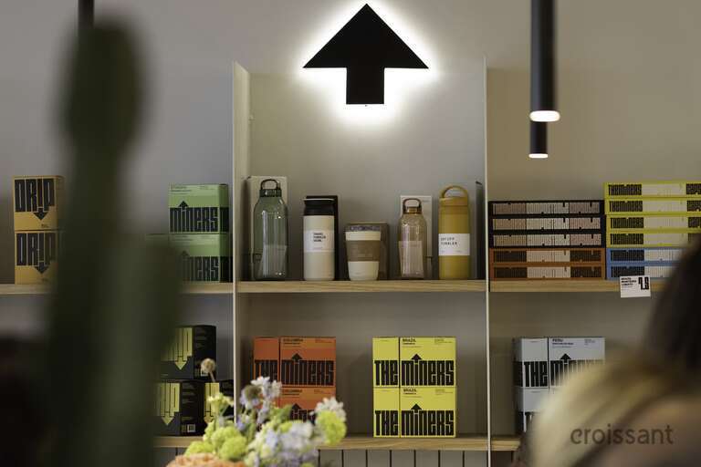 a group of people standing in front of a mirror posing for the camera