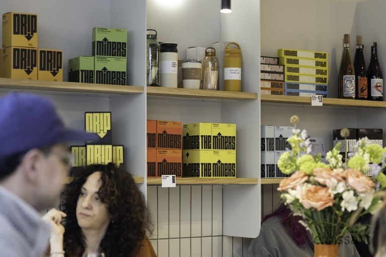 a group of people in a kitchen
